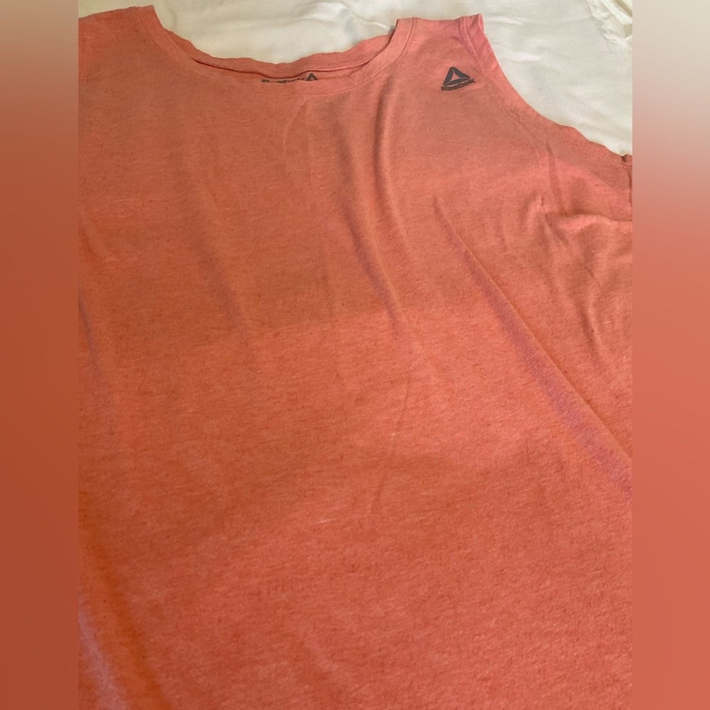 Reebok Tank Top in an orange color.