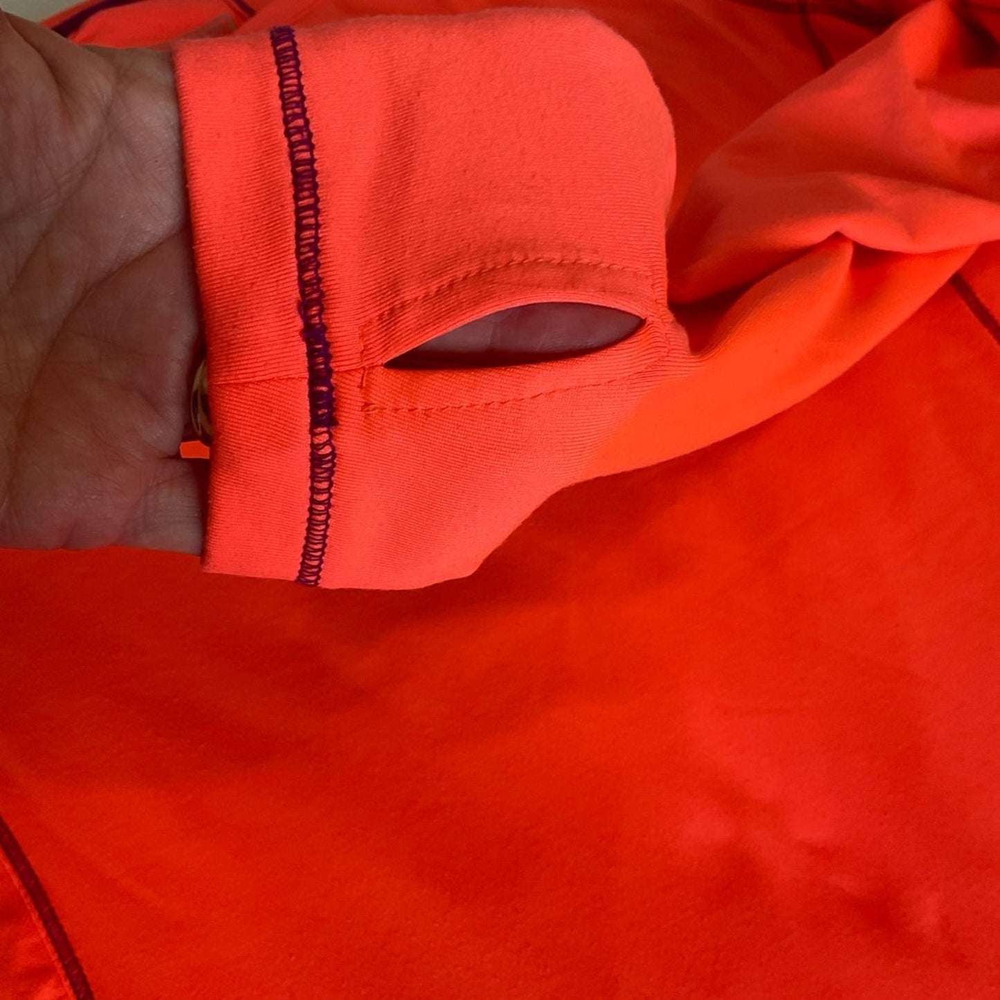 RBX Performance Athletic top with long sleeves and thumb holes.