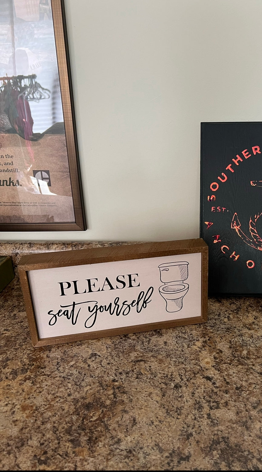 Please seat yourself sign