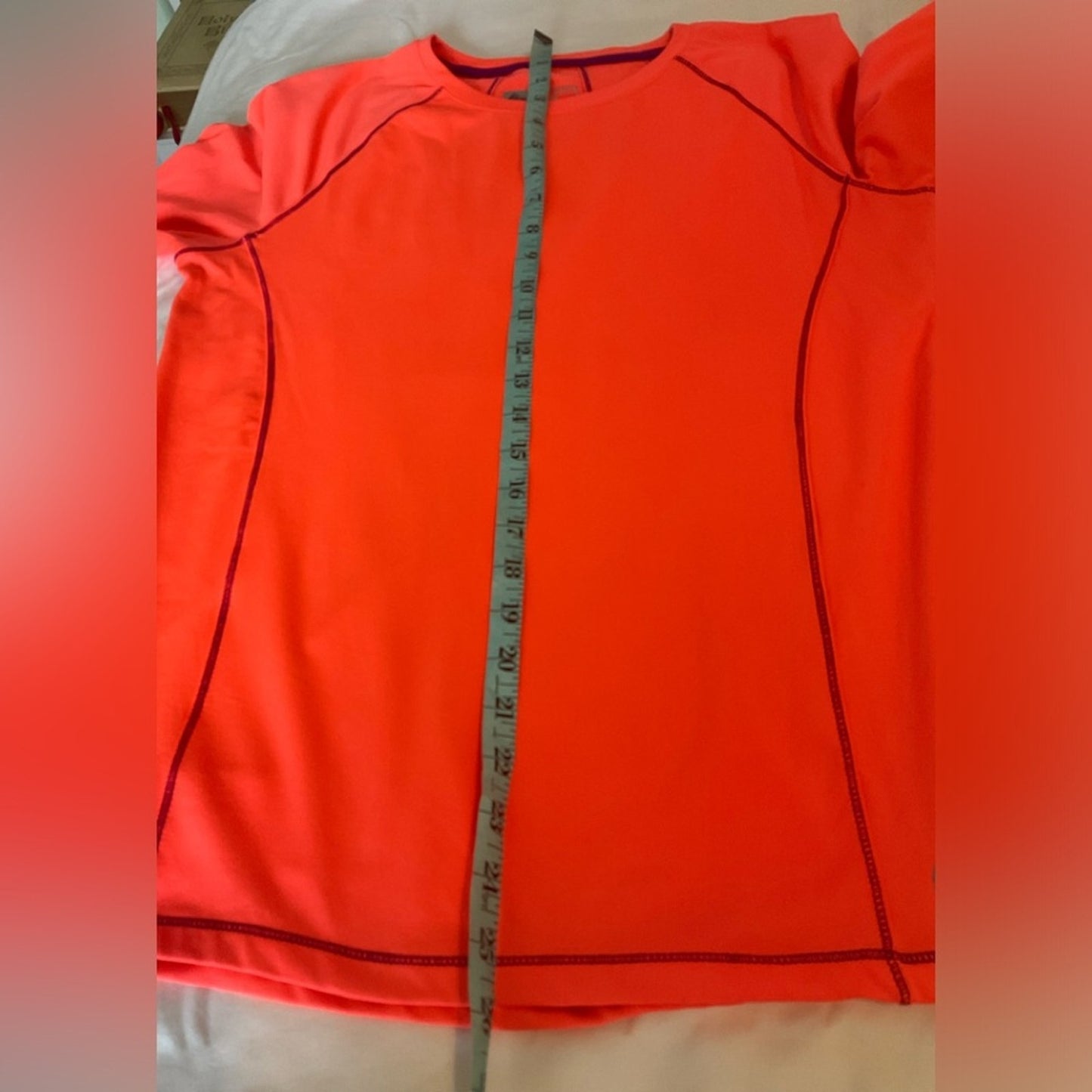 RBX Performance Athletic top with long sleeves and thumb holes.