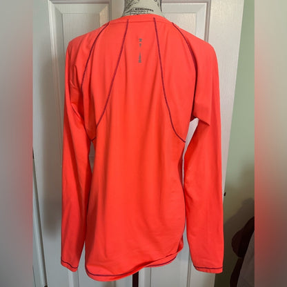 RBX Performance Athletic top with long sleeves and thumb holes.