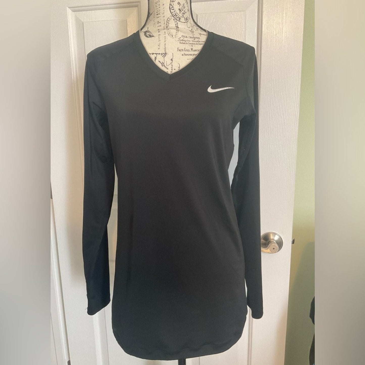 Nike Pro Combat Dri-fit compression pullover with long sleeves and v-neck.