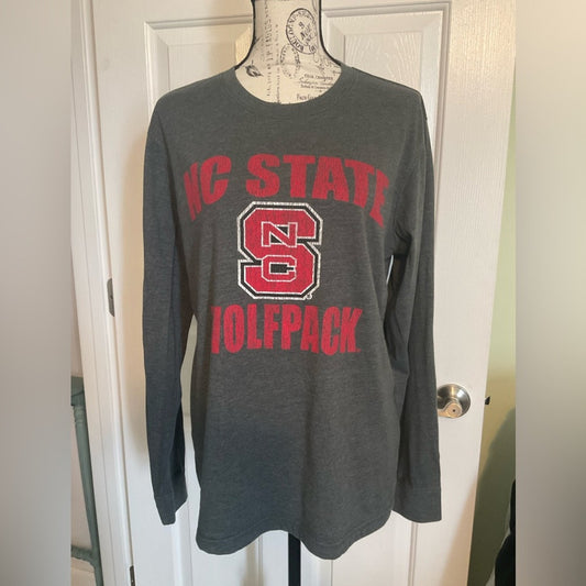 N.C. State Long sleeve t- shirt in dark gray with red lettering