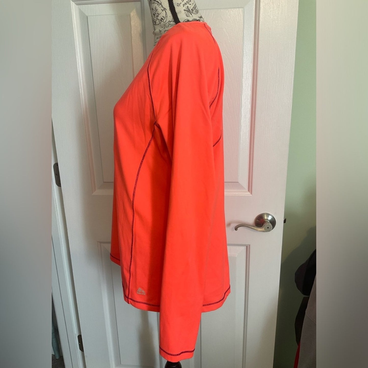 RBX Performance Athletic top with long sleeves and thumb holes.