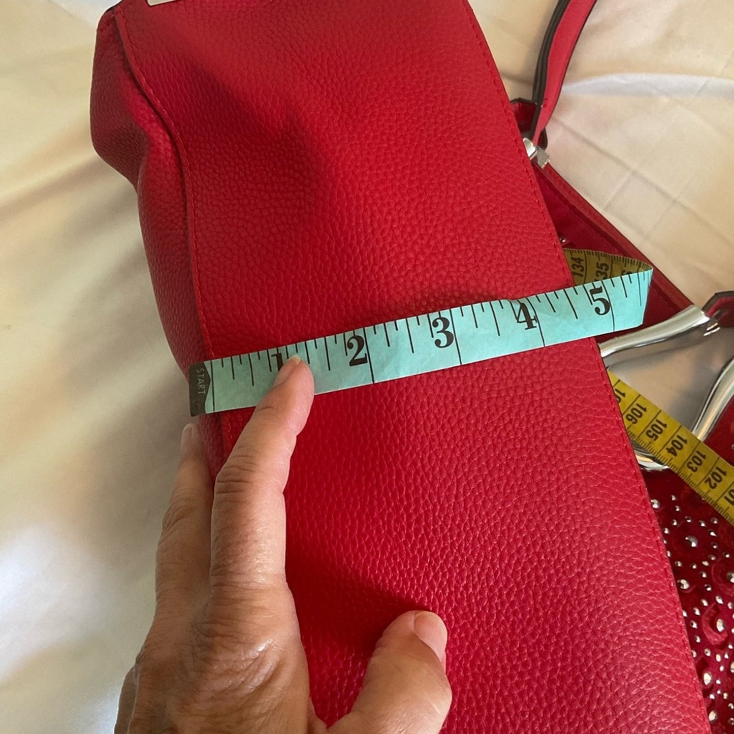 Red Handbag with silver studs and silver trim