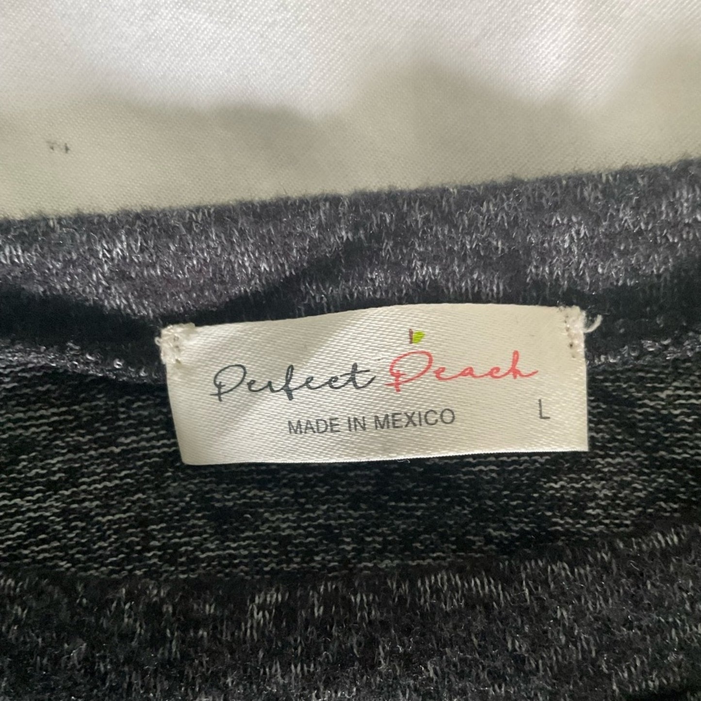 Perfect Peach Classic Black Sweater