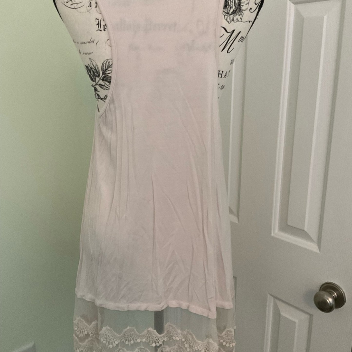 LTX Lace and sheer sleeveless Tunic top