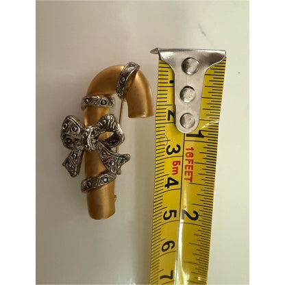 Gold-tone Candy Cane Brooch with Pewter Bow Accent