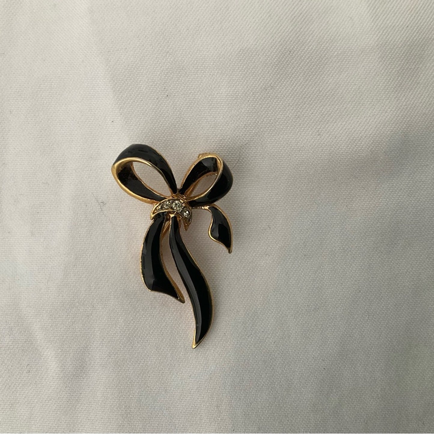 Elegant Black and Gold Bow Brooch