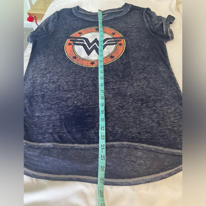 Wonder Woman short sleeve t-shirt in a blue color with the WW emblem.