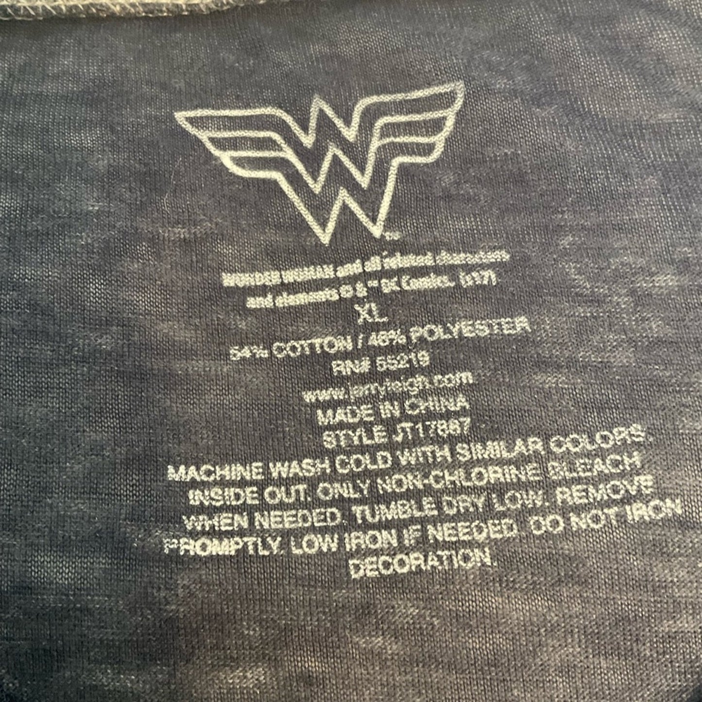 Wonder Woman short sleeve t-shirt in a blue color with the WW emblem.