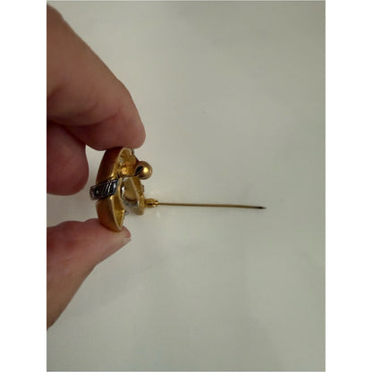 Gold-tone Candy Cane Brooch with Pewter Bow Accent