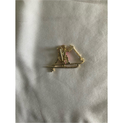 Vintage signed BJ skiing Santa Claus gold tone brooch/pin