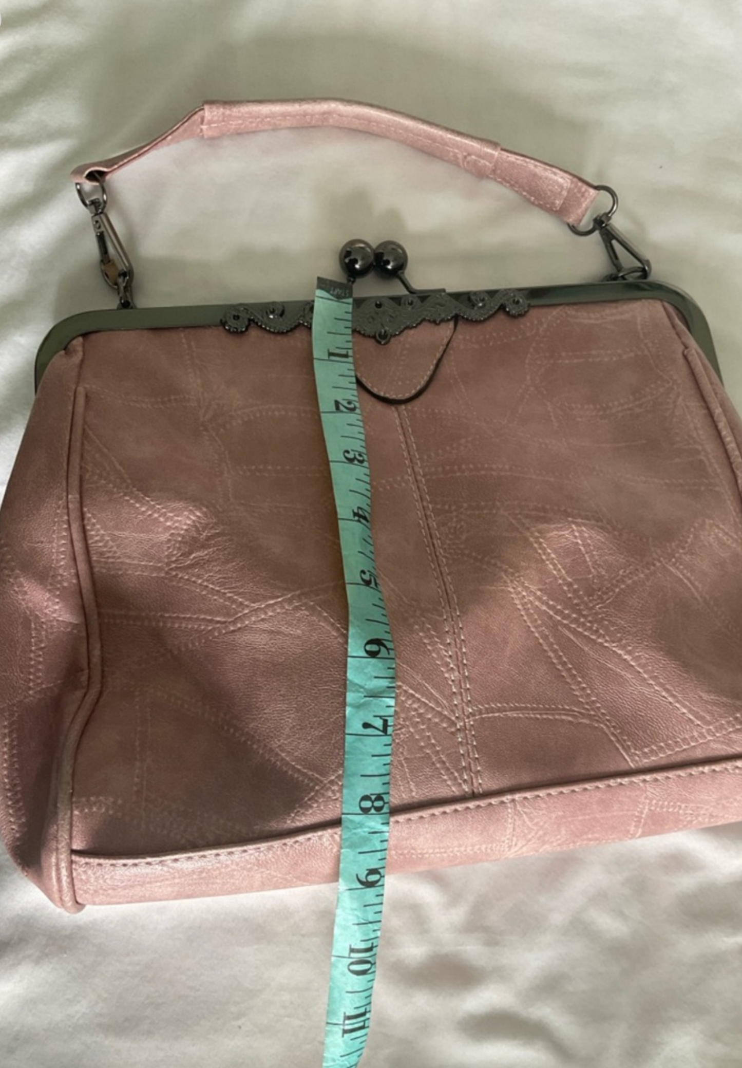 Elegant Pink Frame-Top Wristlet Clutch with Subtle Stitch Detailing