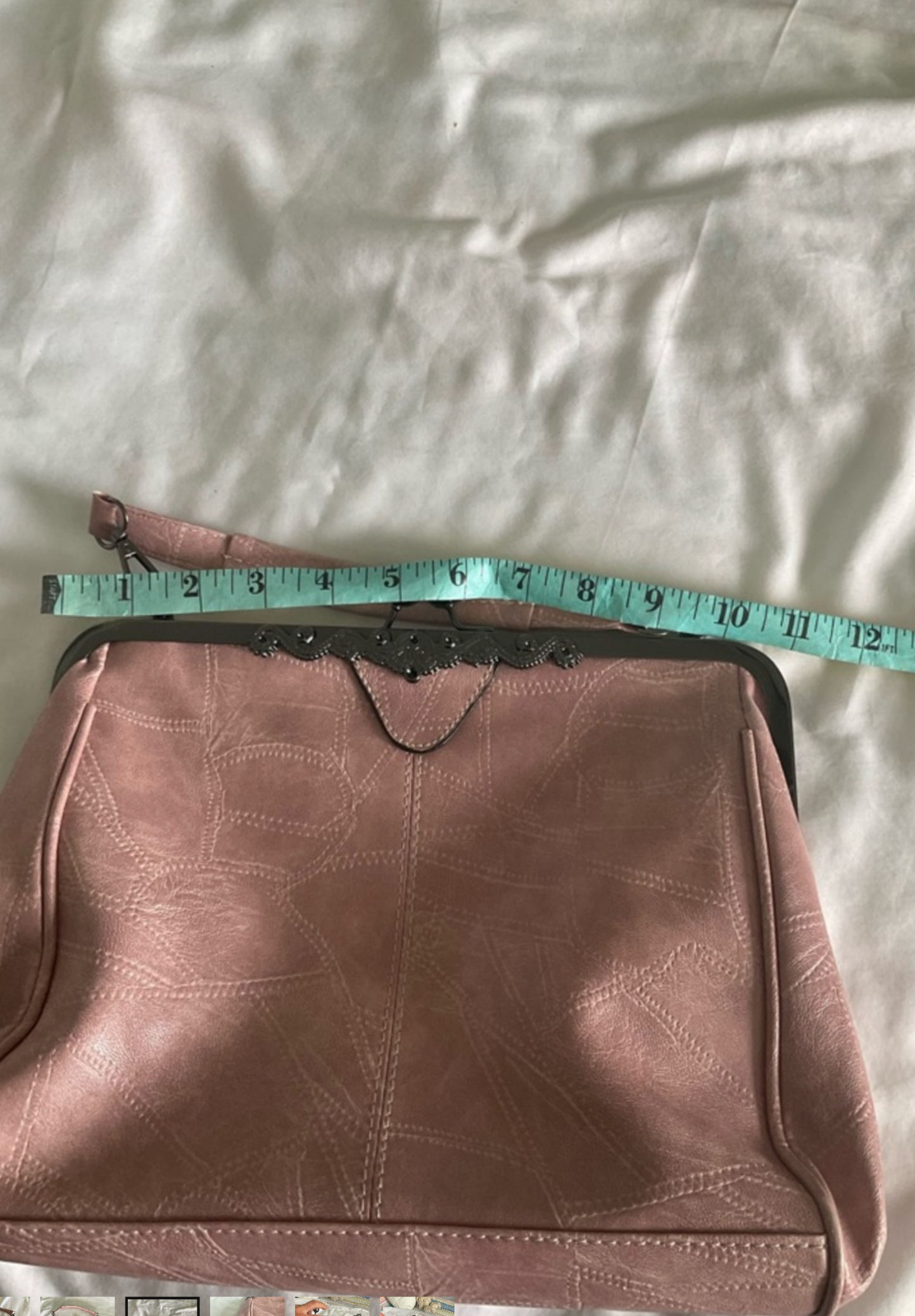 Elegant Pink Frame-Top Wristlet Clutch with Subtle Stitch Detailing