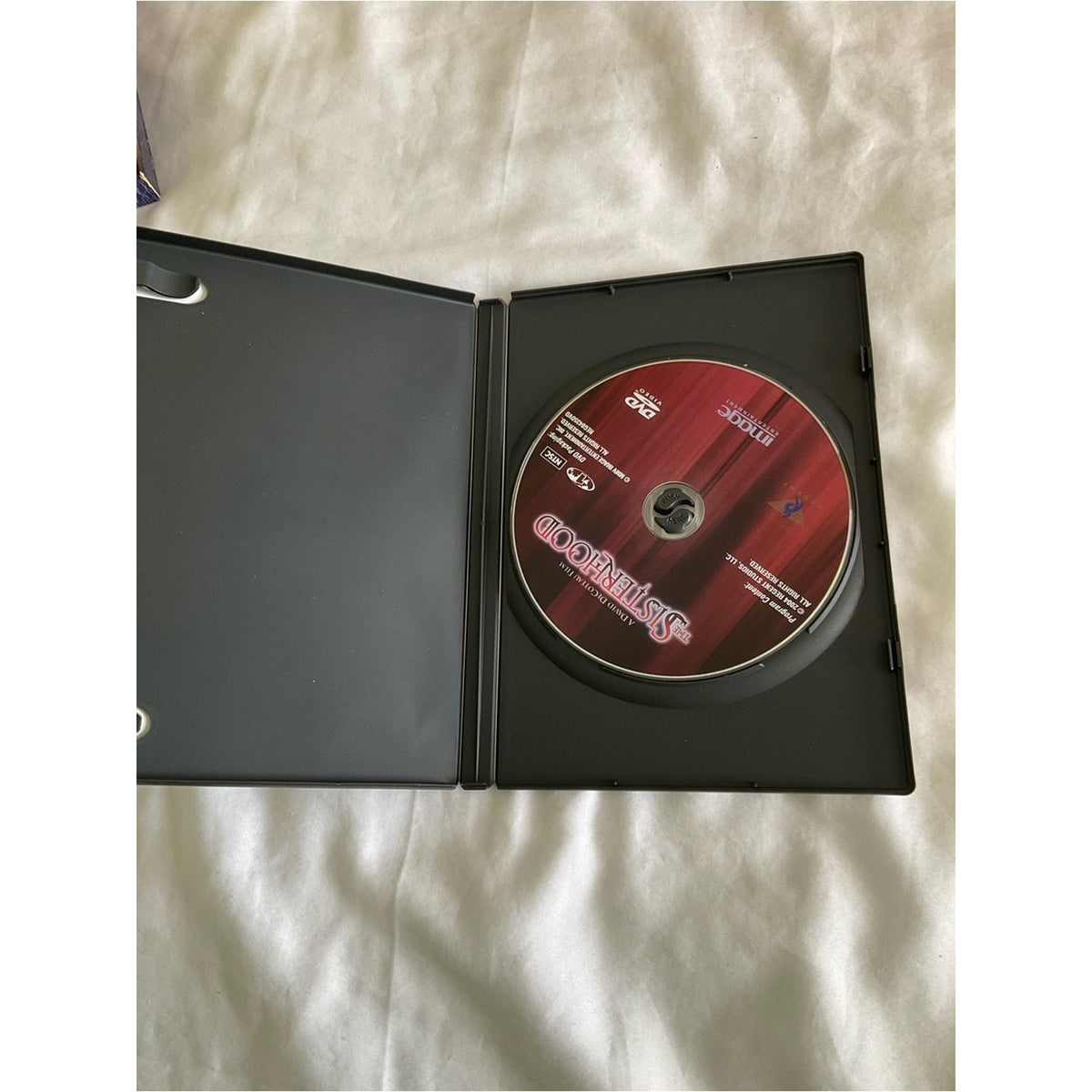 The Sisterhood DVD — White & Red Cover Art