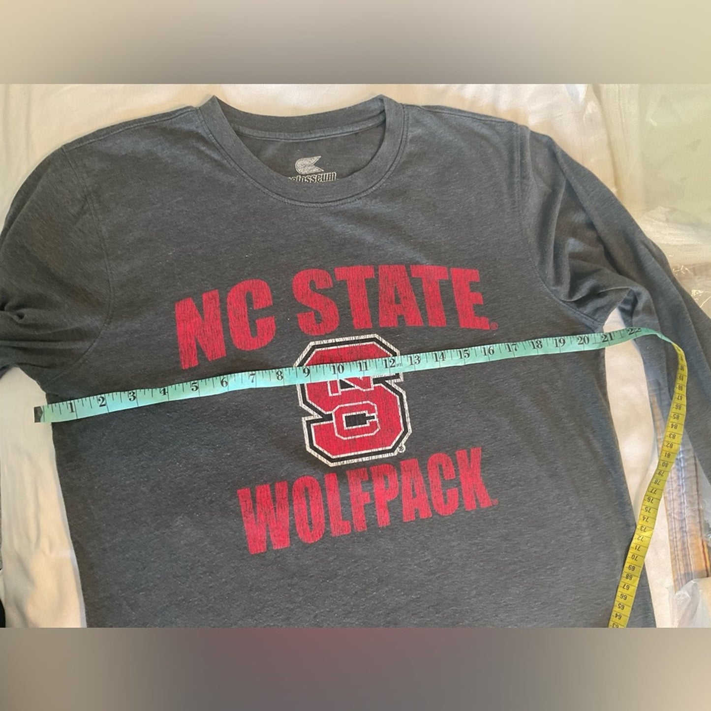 N.C. State Long sleeve t- shirt in dark gray with red lettering