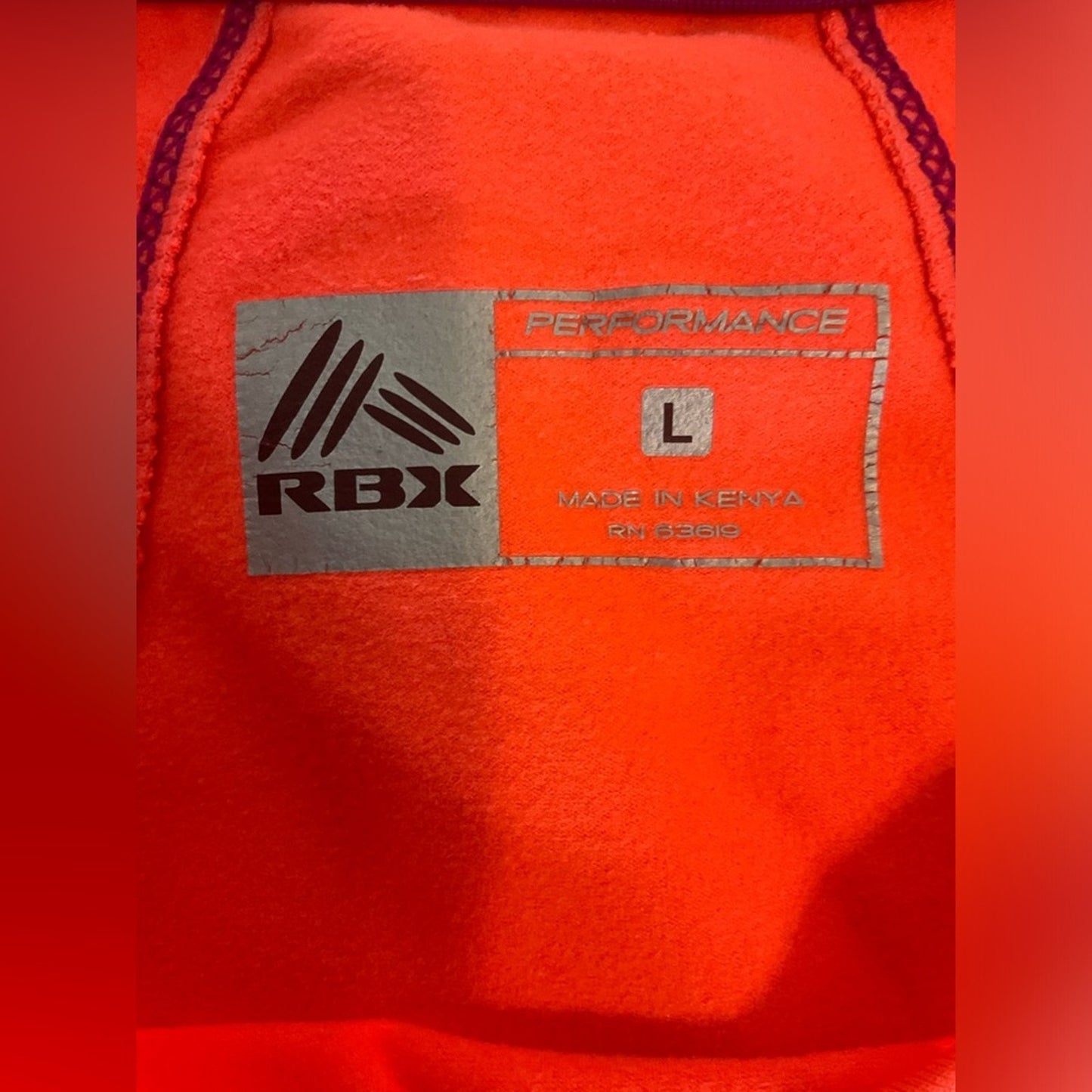 RBX Performance Athletic top with long sleeves and thumb holes.