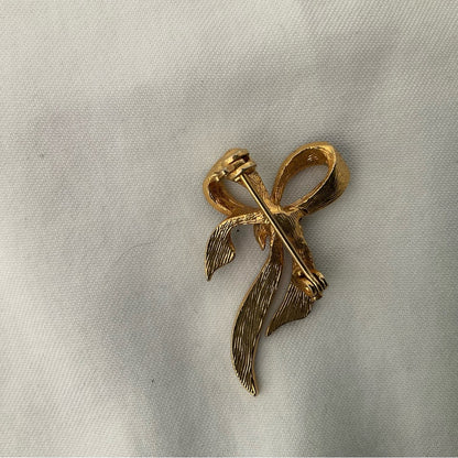 Elegant Black and Gold Bow Brooch